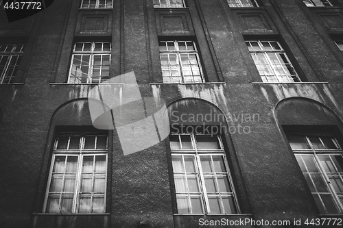 Image of Dark building with tall windows