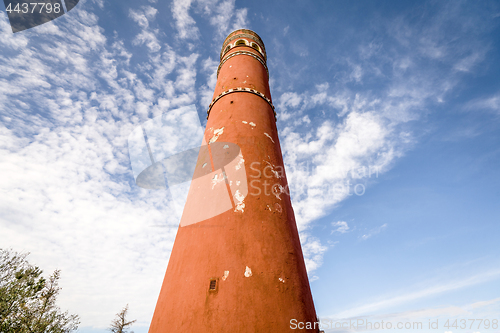 Image of Tall red round tower heading to the sky