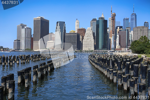 Image of Manhattan Skyline with wooden logs, New York City