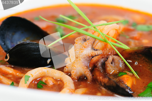 Image of Seafood Soup in white dish closeup