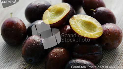 Image of Fresh plum on table 