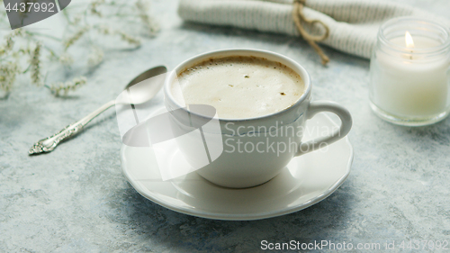 Image of Cup of coffee and candle