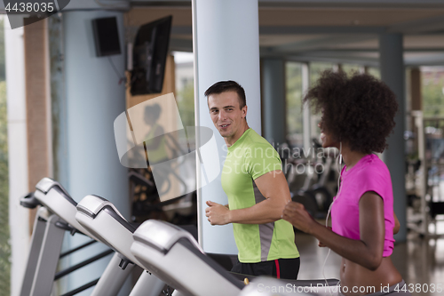 Image of people exercisinng a cardio on treadmill