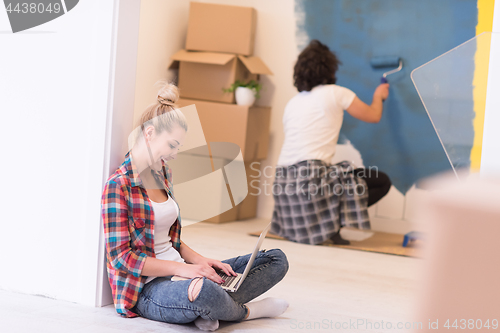 Image of Happy couple doing home renovations