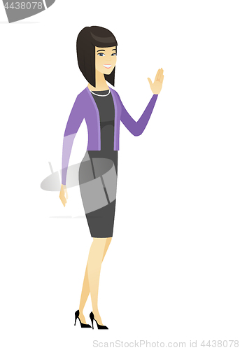 Image of Young asian business woman waving her hand.