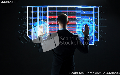 Image of businessman with virtual construction project