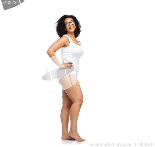 Image of happy african american woman in white underwear