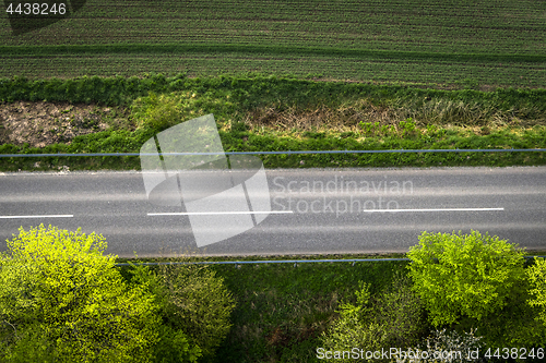 Image of Asphalt road with white stripes