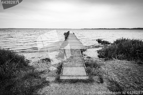 Image of Black and white photo of a wooden pier