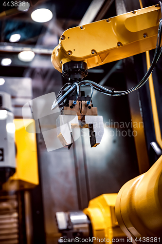 Image of Robotic Arm modern industrial technology. Automated production c