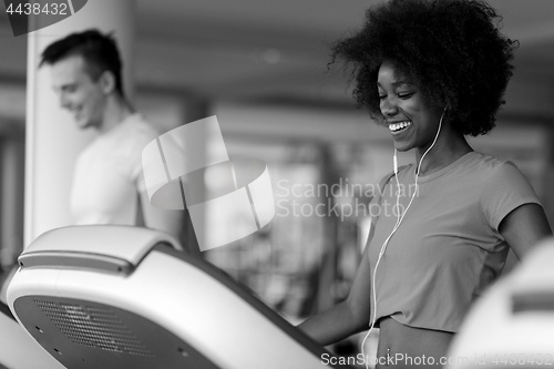 Image of people exercisinng a cardio on treadmill