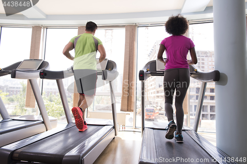 Image of people exercisinng a cardio on treadmill in gym