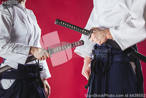 Image of The two men are training Aikido at studio