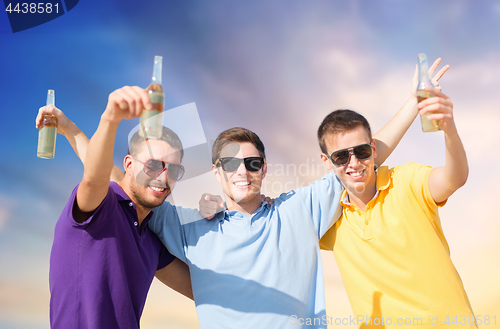 Image of male friends with bottles of drink