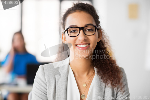 Image of portrait of african american woman at office