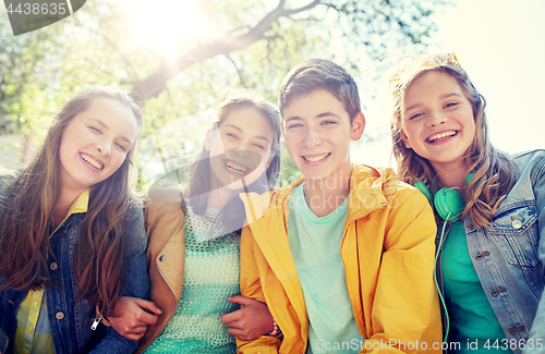 Image of happy teenage students or friends outdoors