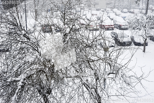 Image of view from the window to the car parking in winter