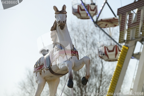 Image of carousel horse in an amusement park 