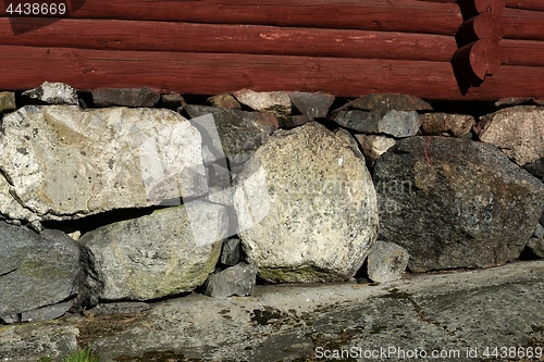 Image of old masonry in the basement of a wooden house