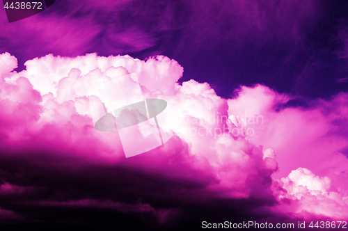 Image of purple clouds in the dark sky