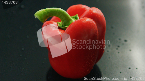 Image of Red pepper with drops on surface