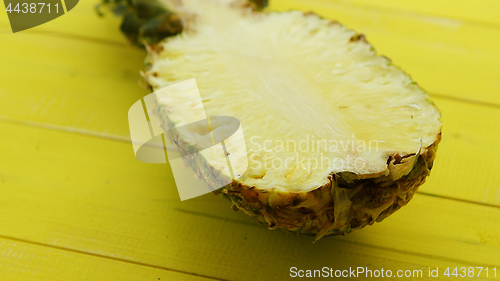 Image of Half of cut fresh pineapple