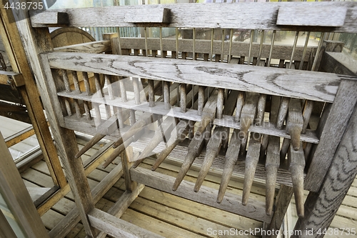 Image of old wooden carillon bells keyboard