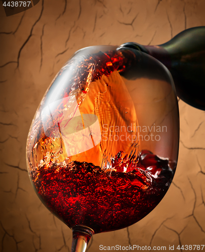 Image of Red wine on clay background