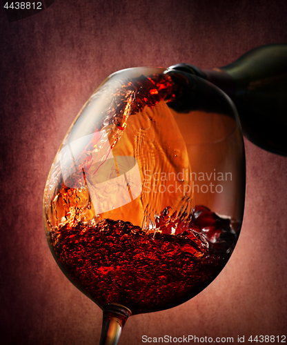 Image of Wine on a burgundy background