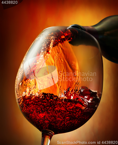 Image of Red wine on an orange background