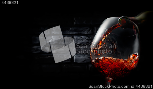 Image of Wine on black bricks