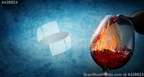 Image of Wine on textured blue