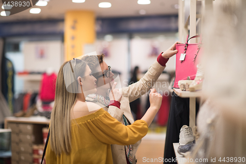 Image of best friend shopping in big mall