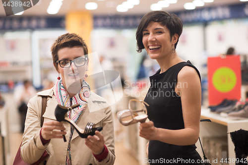 Image of best friend shopping in big mall