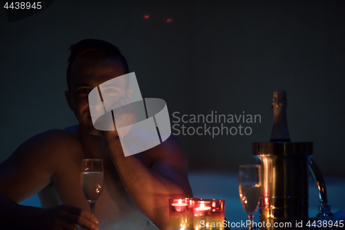 Image of man relaxing in the jacuzzi