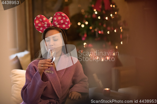 Image of woman drinking champagne at spa