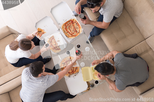 Image of Pizza time a group of people