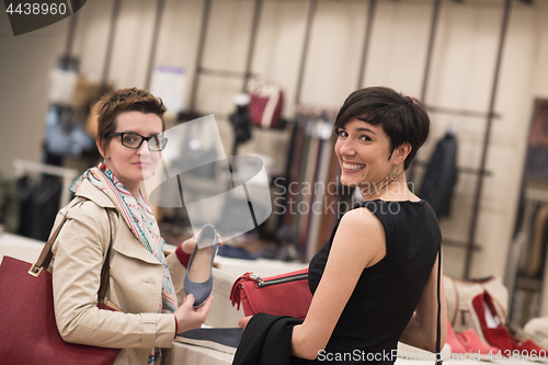 Image of best friend shopping in big mall