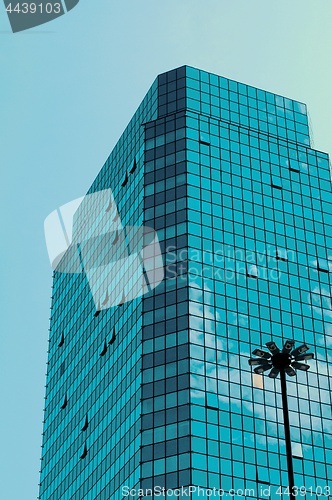 Image of Modern Building with Mirrored Clouds 