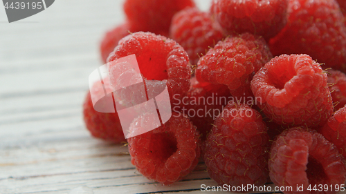 Image of Closeup heap of raspberries