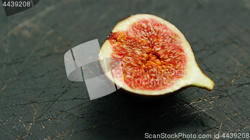 Image of Half of fig with red flesh