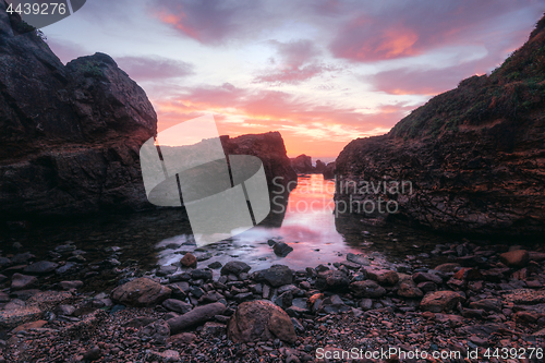 Image of Sunrise skies over Nuns Baths
