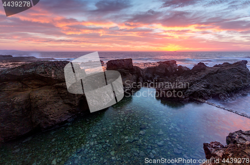 Image of Sunrise skies over Nuns Baths