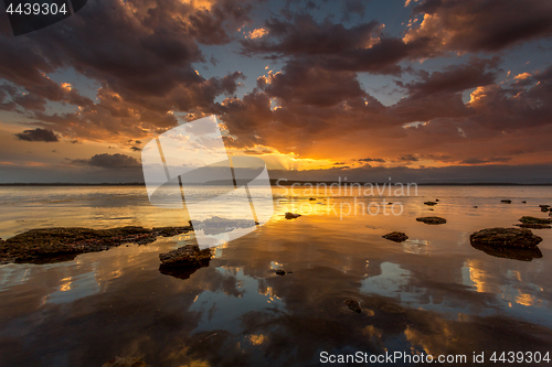 Image of Rich warm colours of the sunset and reflections Australia