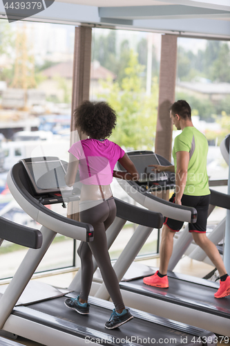 Image of people exercisinng a cardio on treadmill