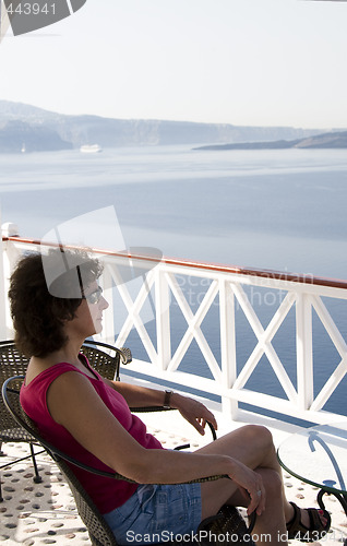 Image of tourist relaxing in santorini