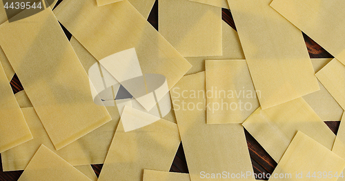 Image of Heap of lasagna sheets on table