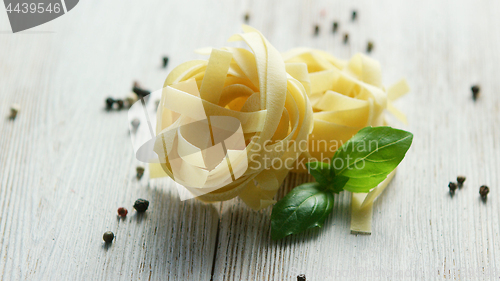 Image of Small bunches of uncooked pasta
