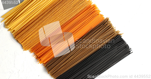 Image of Uncooked multicolored spaghetti