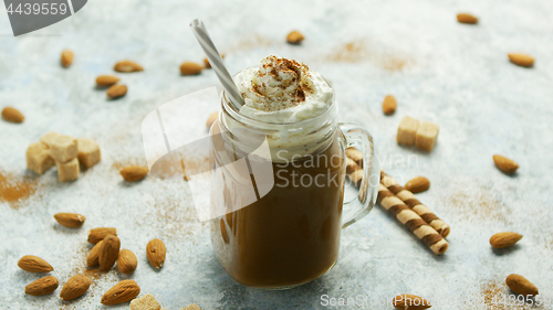 Image of Cup of cacao with whipped cream and caramel